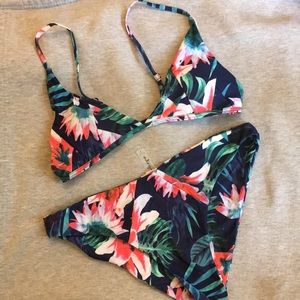 NEVER WORN bikini w/ tags and hygiene strip.